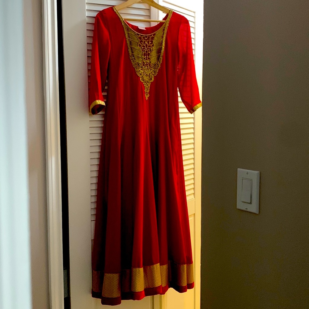 Red chiffon Anarkali with beautiful gold detailing design